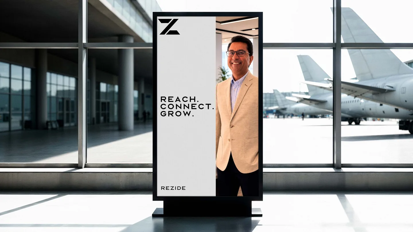 Rezide airport standee: Reach. Connect. Grow.