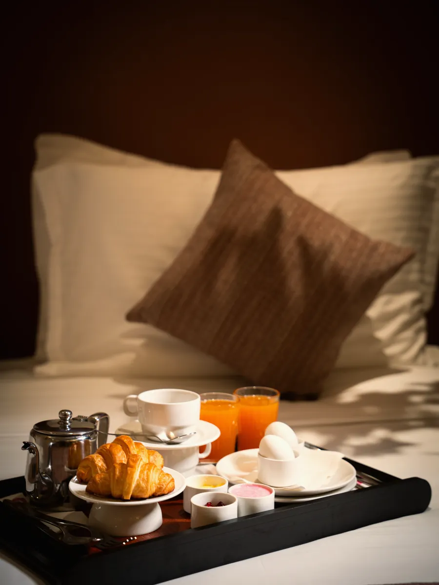 Breakfast tray served in bed at a Centre Point hotel